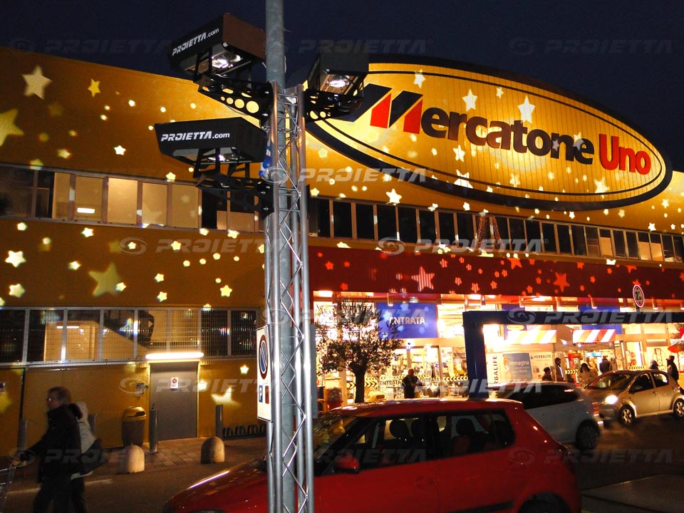 mercatone uno, proiezione di caduta di stelle, luminarie natalizie